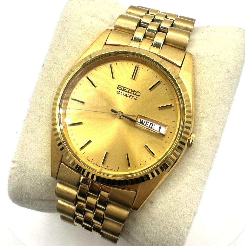 Seiko 7N43-8111 Quartz Day Date gold 37mm dial jubilee stainless steel watch